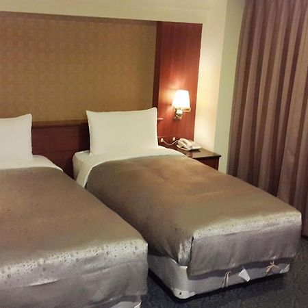 גאושיונג Jing Jing Holiday Hotel מראה חיצוני תמונה