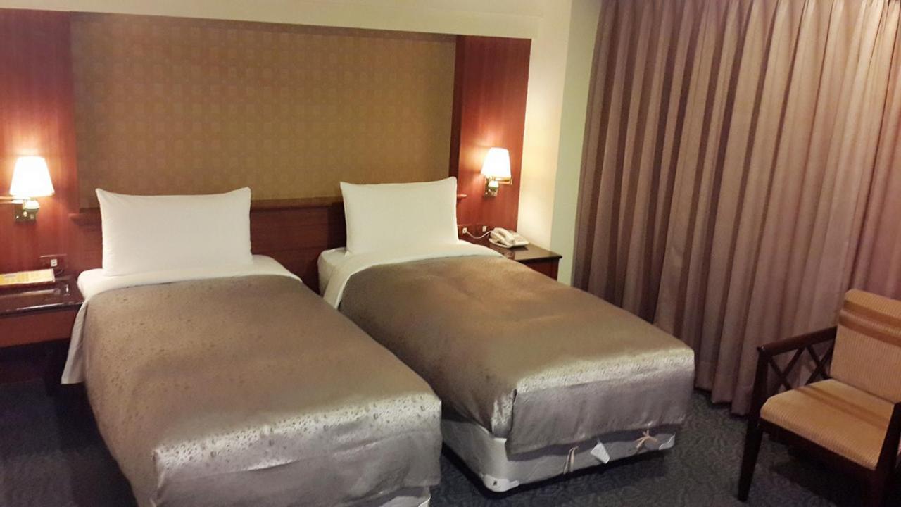 גאושיונג Jing Jing Holiday Hotel מראה חיצוני תמונה