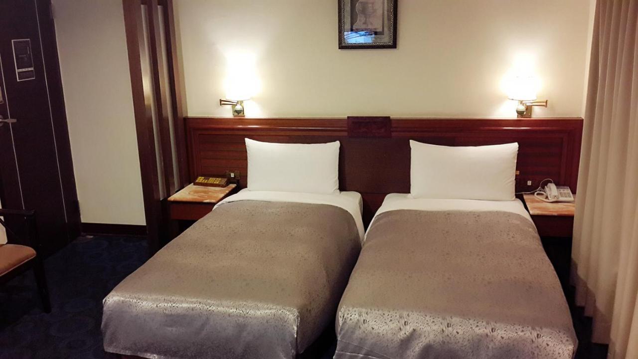 גאושיונג Jing Jing Holiday Hotel מראה חיצוני תמונה